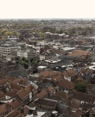 Layered rooftops packed across a hillside